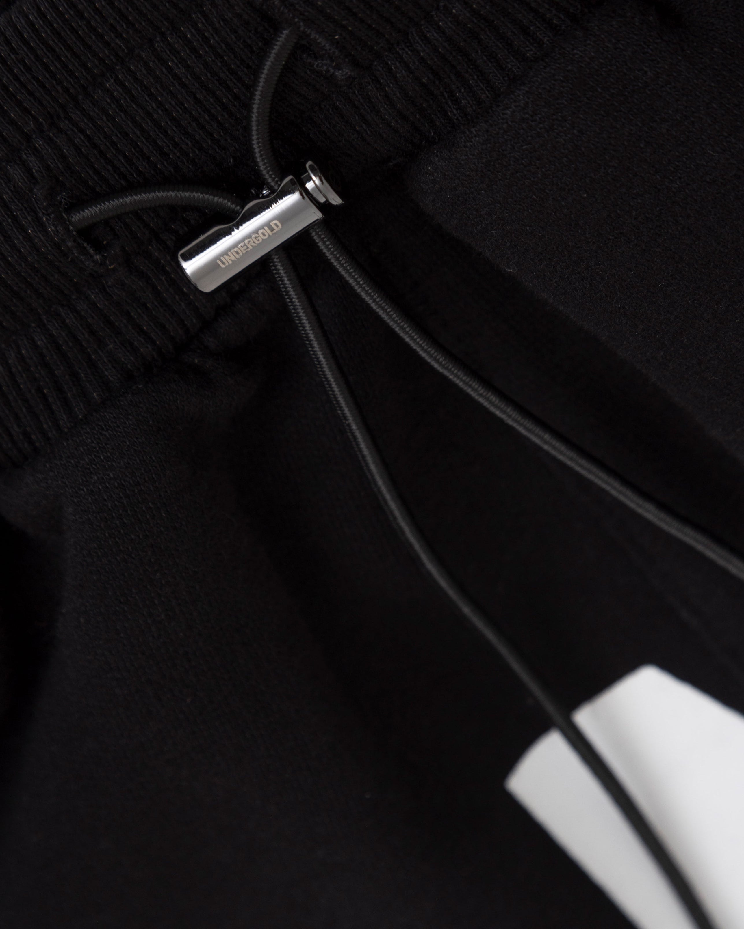 The One UNDGLD Biased Shorts Black