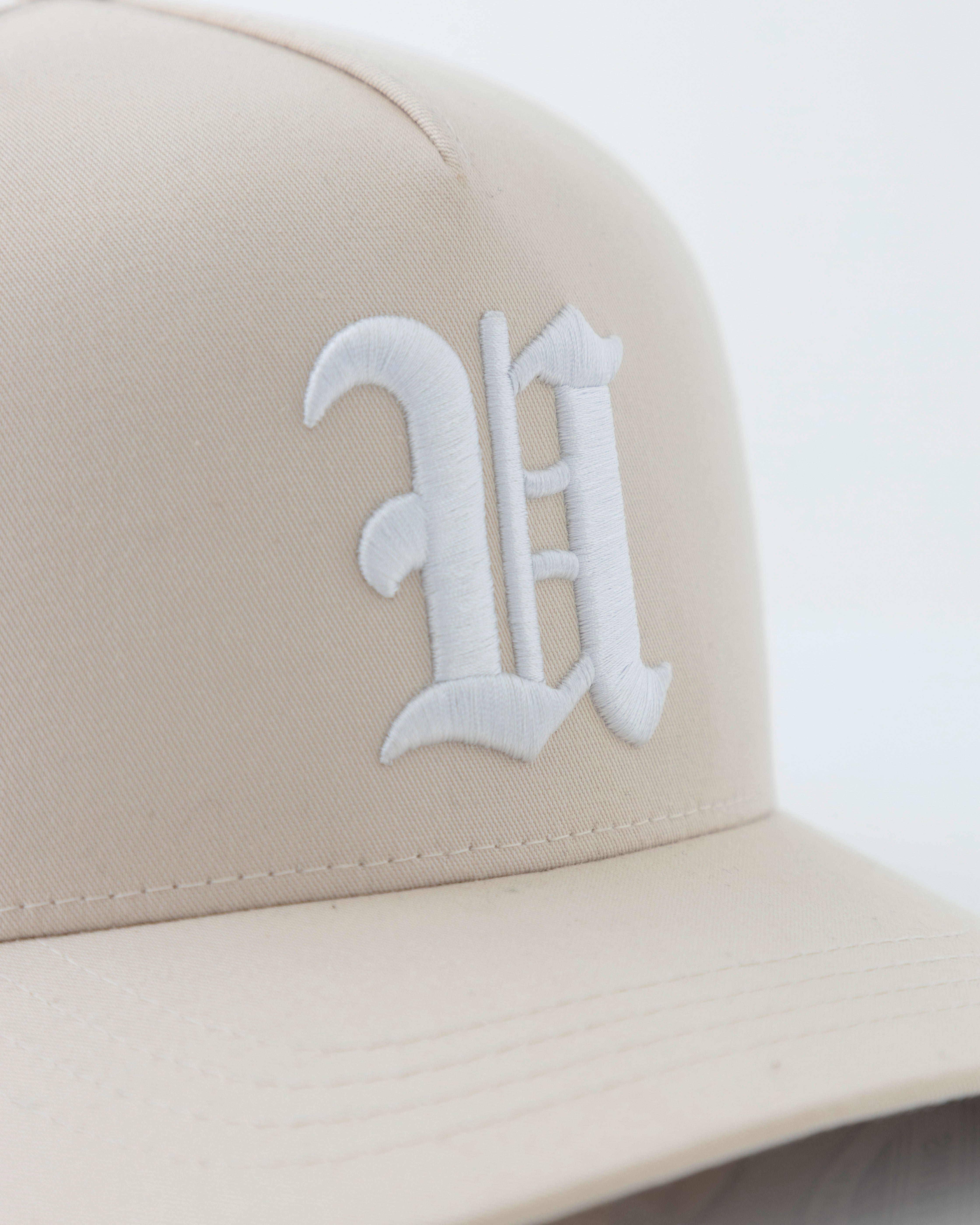 Line U High Crown Cap Cream