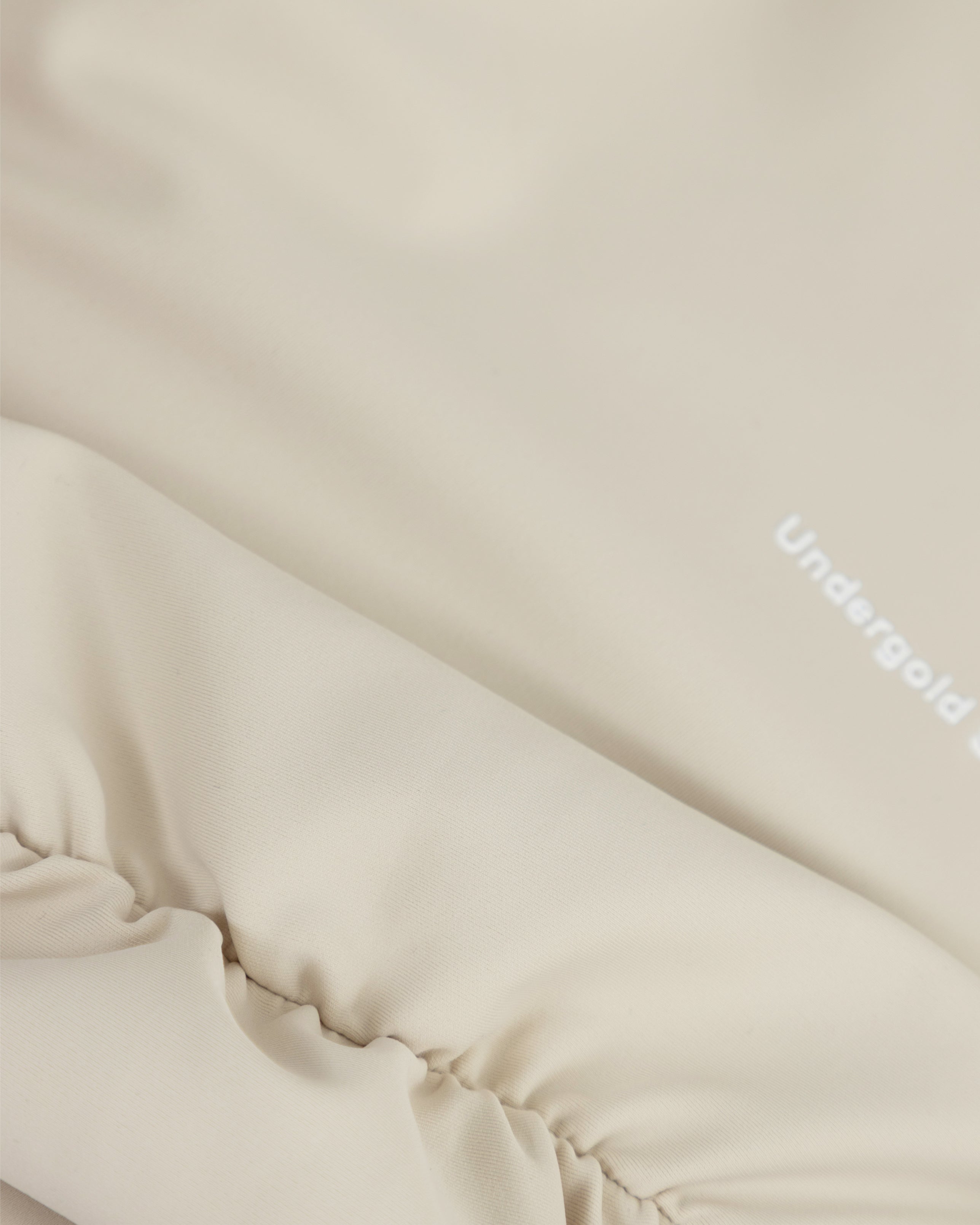 Basics Undergold Studio Backless Long Sleeve Body Cream